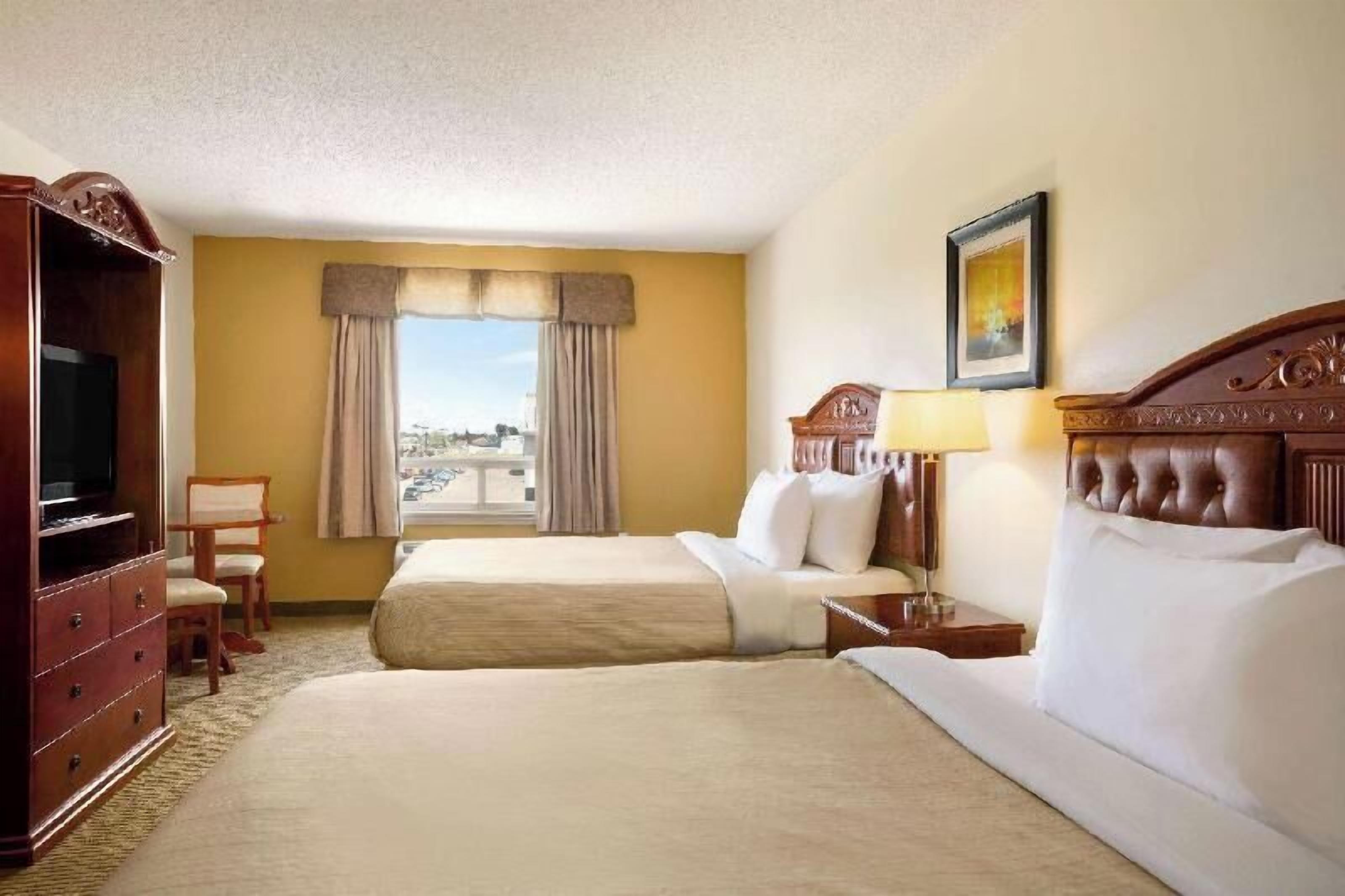 Pillow-top beds, desk, iron/ironing board, rollaway beds