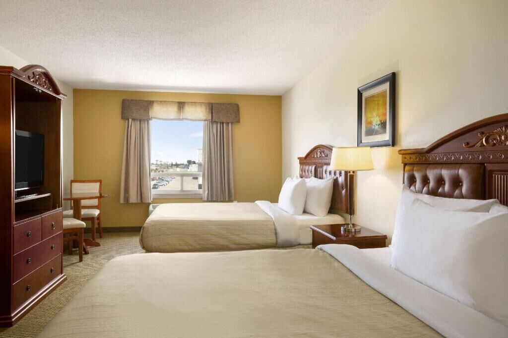 Pillow-top beds, desk, iron/ironing board, rollaway beds