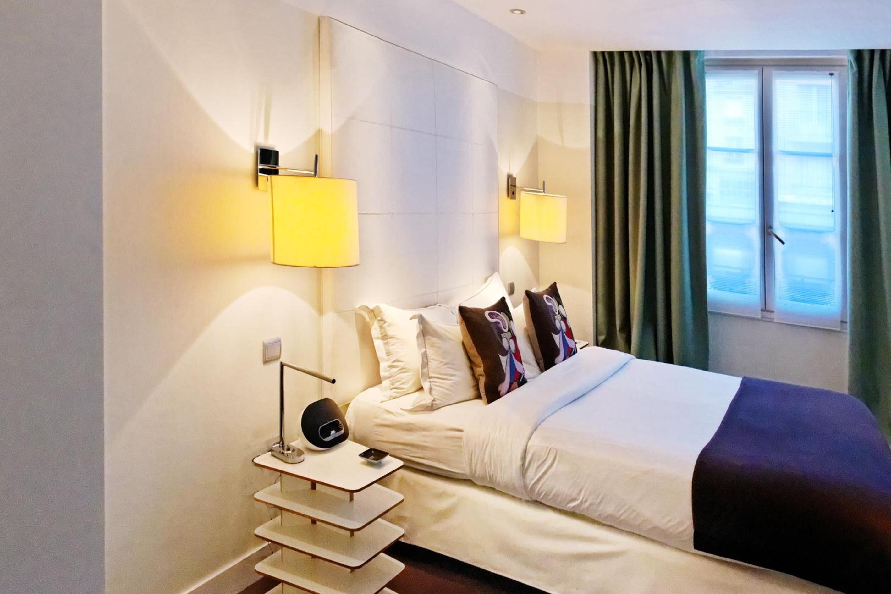 premium bedding, down duvets, minibar, in-room safe