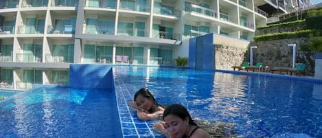 Outdoor pool, sun loungers