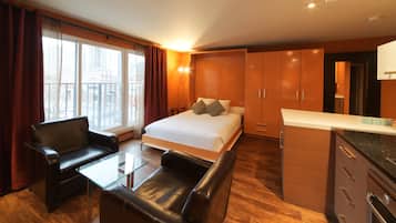 Suite studio Deluxe, 1 grand lit | Literie de qualité, décor unique, ameublement unique