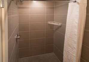 Business Studio Suite, 2 Queen Beds | Bathroom | Shower, rainfall showerhead, free toiletries, hair dryer - Nuvo Hotel & Suites (Calgary)