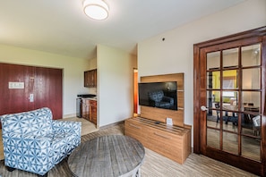 Suite, 1 King Bed (Additional Living and Dining Area) | In-room safe, desk, iron/ironing board, cribs/infant beds