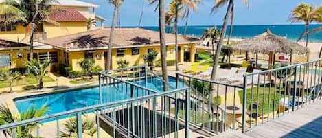 Standard Room, 1 Queen Bed, Garden View | Beach | Private beach