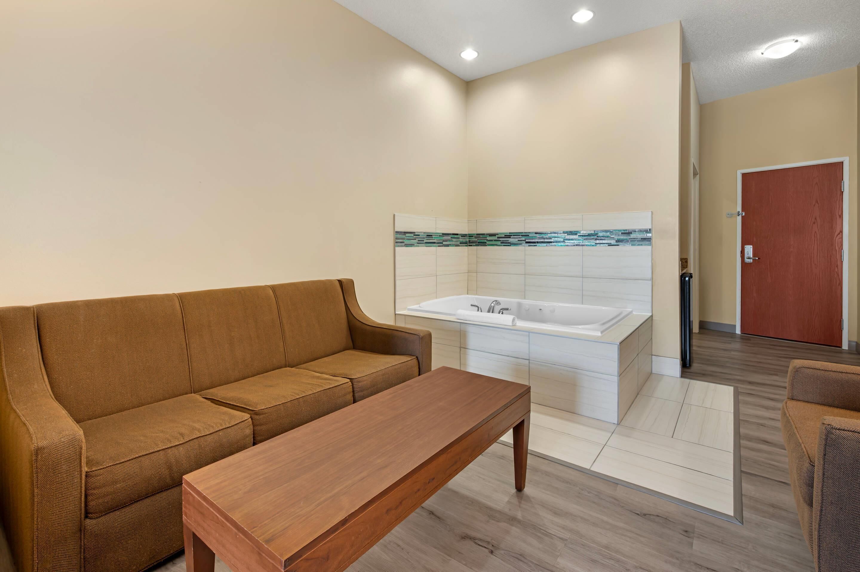 suite, 1 king bed with sofa bed, non smoking, jetted tub | desk, blackout curtains, iron/ironing board, free wifi