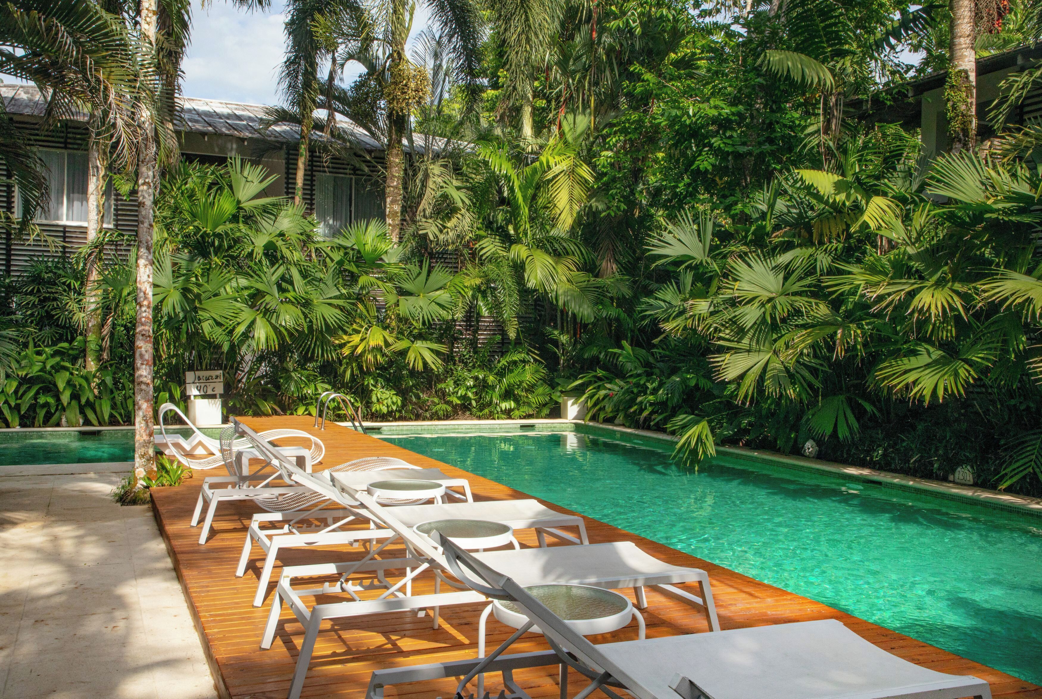 3 outdoor pools, open 8:00 am to 9:00 pm, pool umbrellas, pool loungers