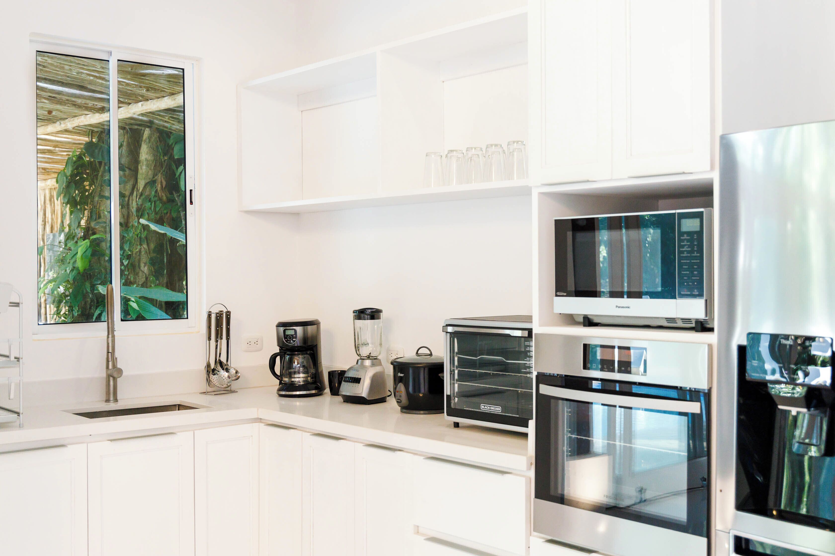 villa paparazzi | private kitchen | espresso maker, high chair