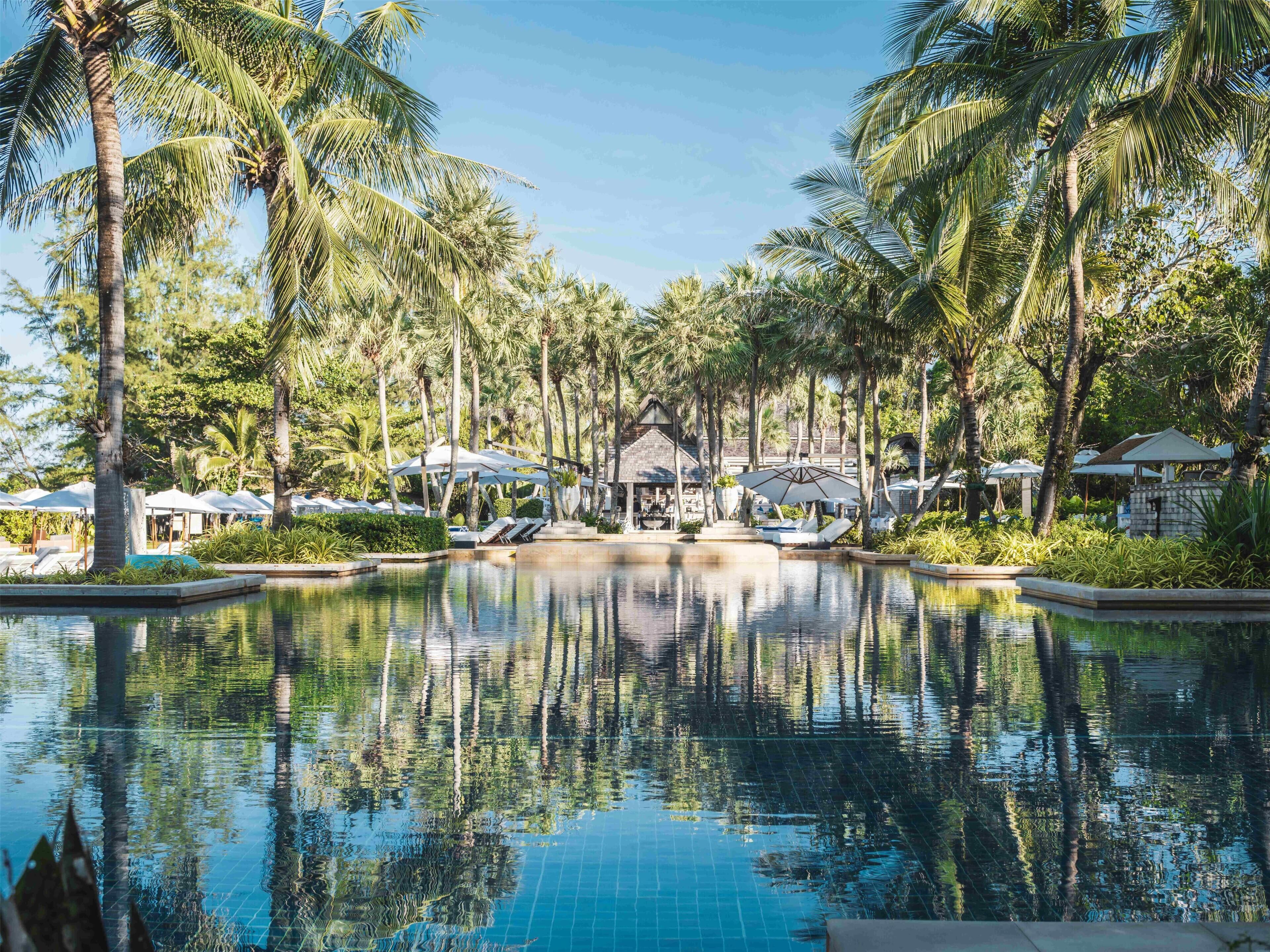 2 outdoor pools, open 7:00 AM to 8:00 PM, free cabanas, pool umbrellas