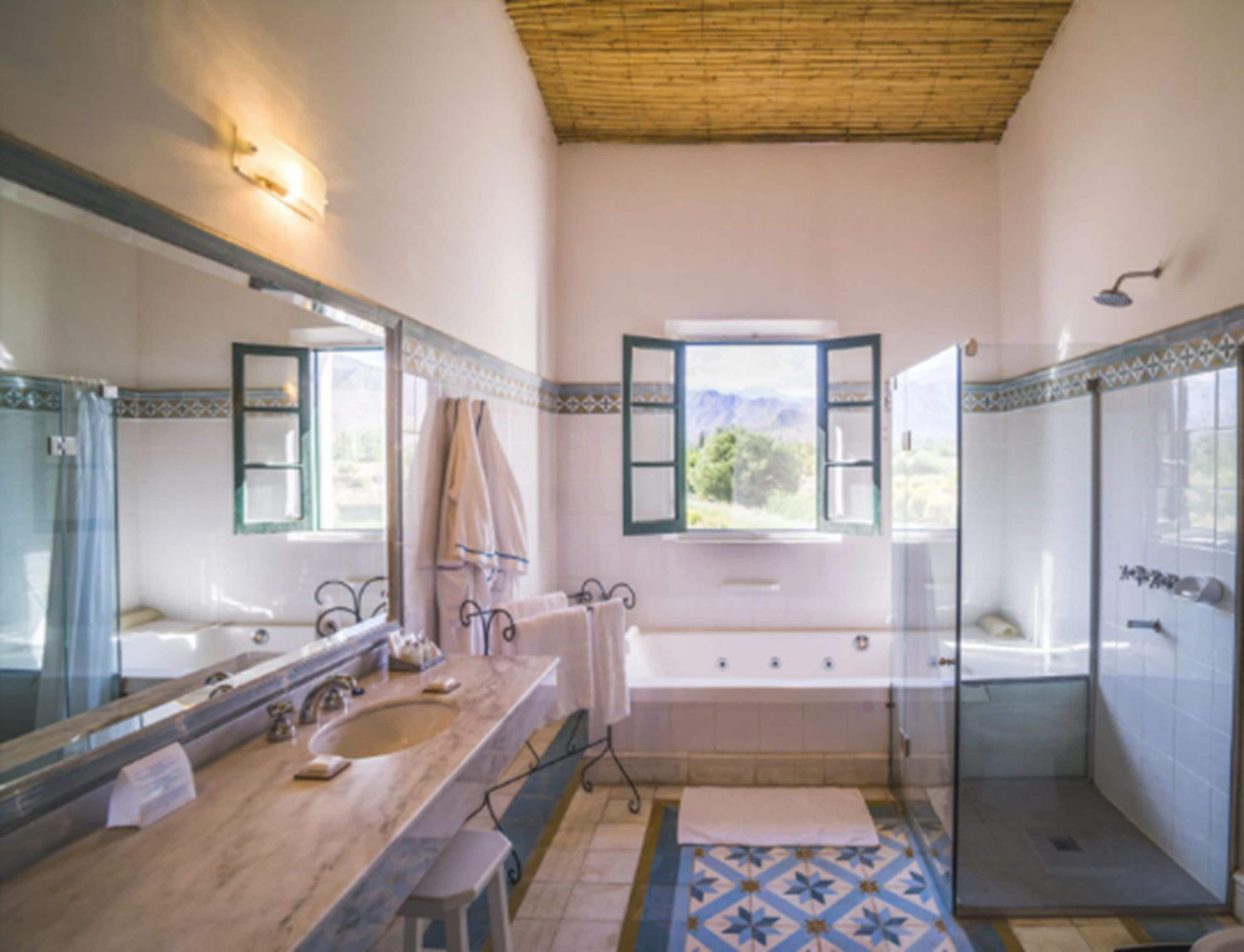 combined shower/bathtub, deep-soaking bathtub, hair dryer, bidet