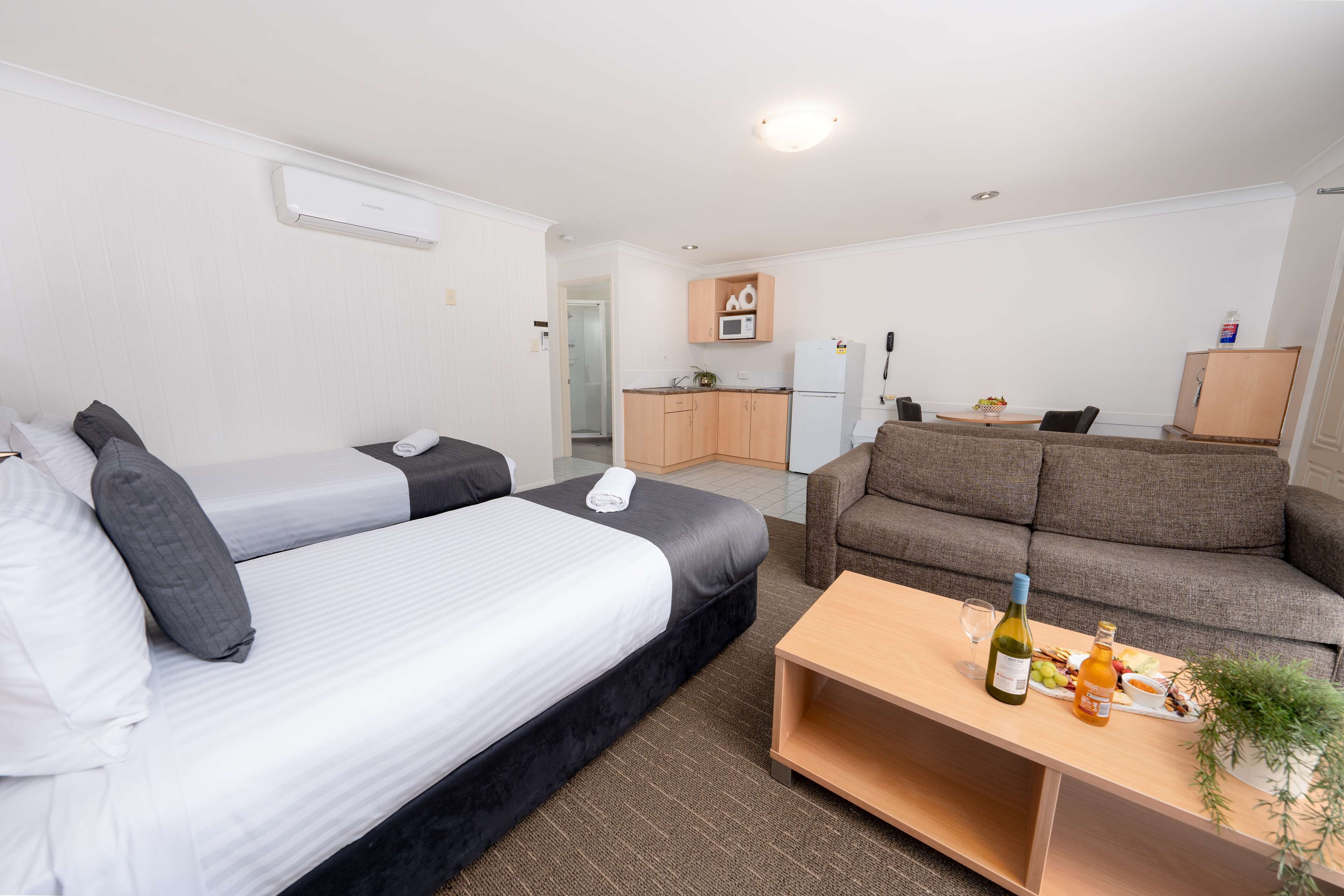 family suite, multiple beds, non smoking, kitchenette | premium bedding, pillow-top beds, minibar, laptop workspace