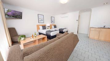 Family Suite, Multiple Beds, Non Smoking, Kitchenette | Premium bedding, pillowtop beds, minibar, laptop workspace