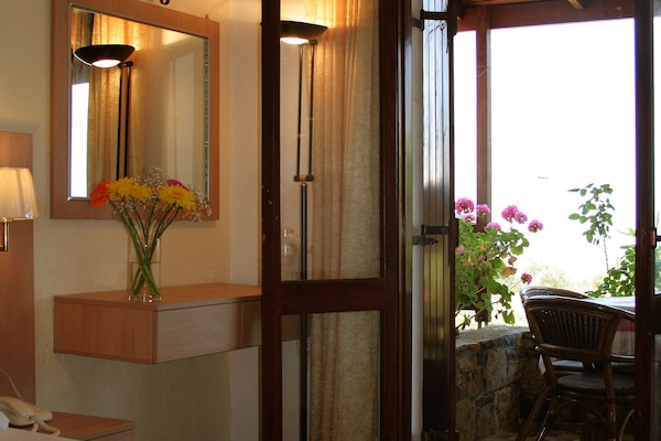 Lovenest Studio | Premium bedding, pillowtop beds, in-room safe, desk