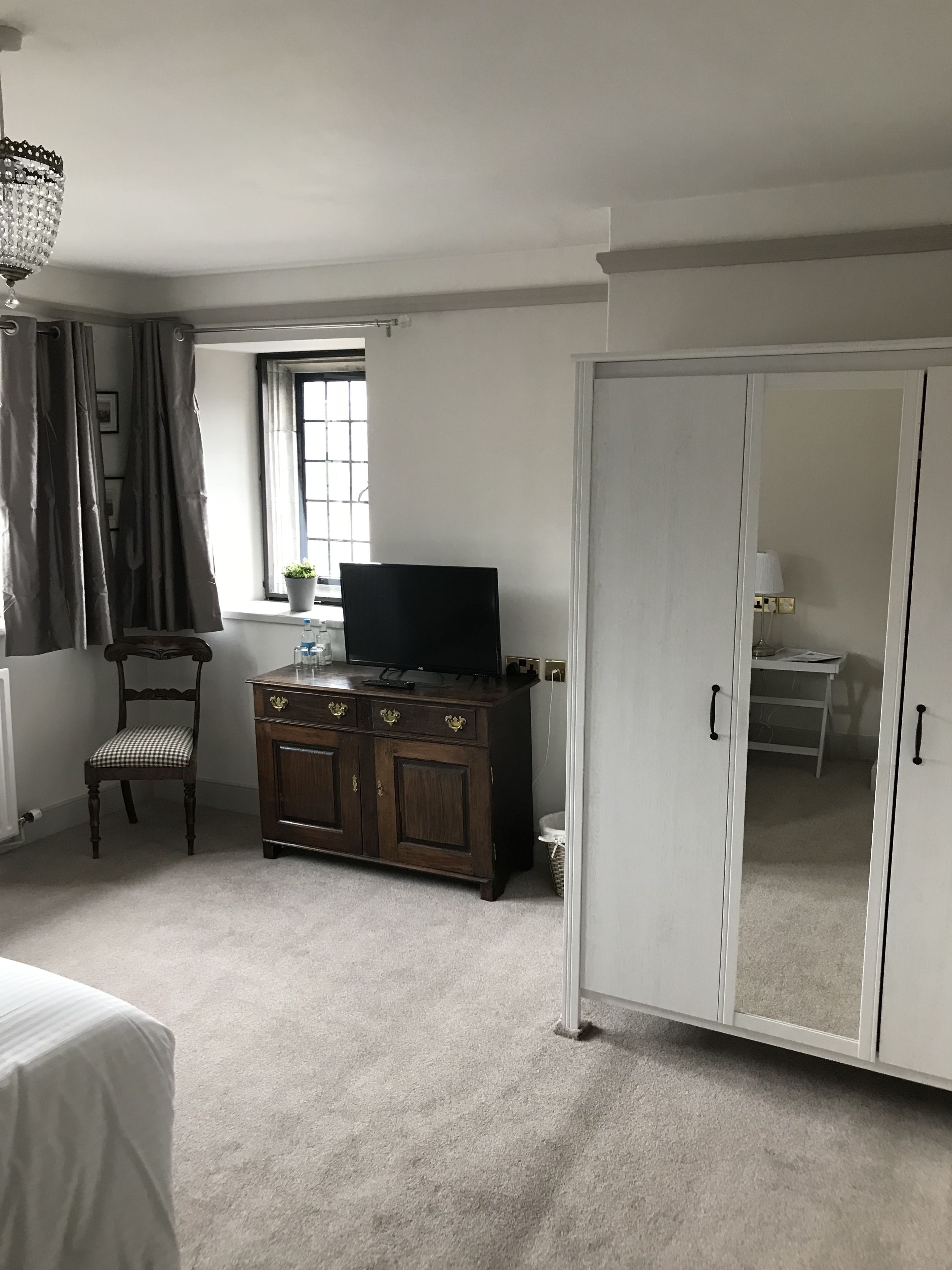 Desk, blackout curtains, iron/ironing board, cots/infant beds