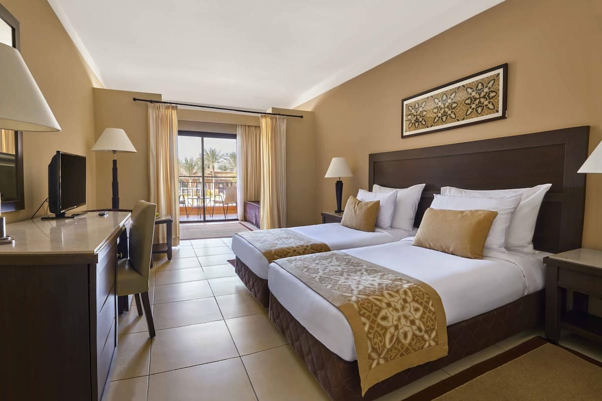 Minibar, in-room safe, individually furnished, free cribs/infant beds