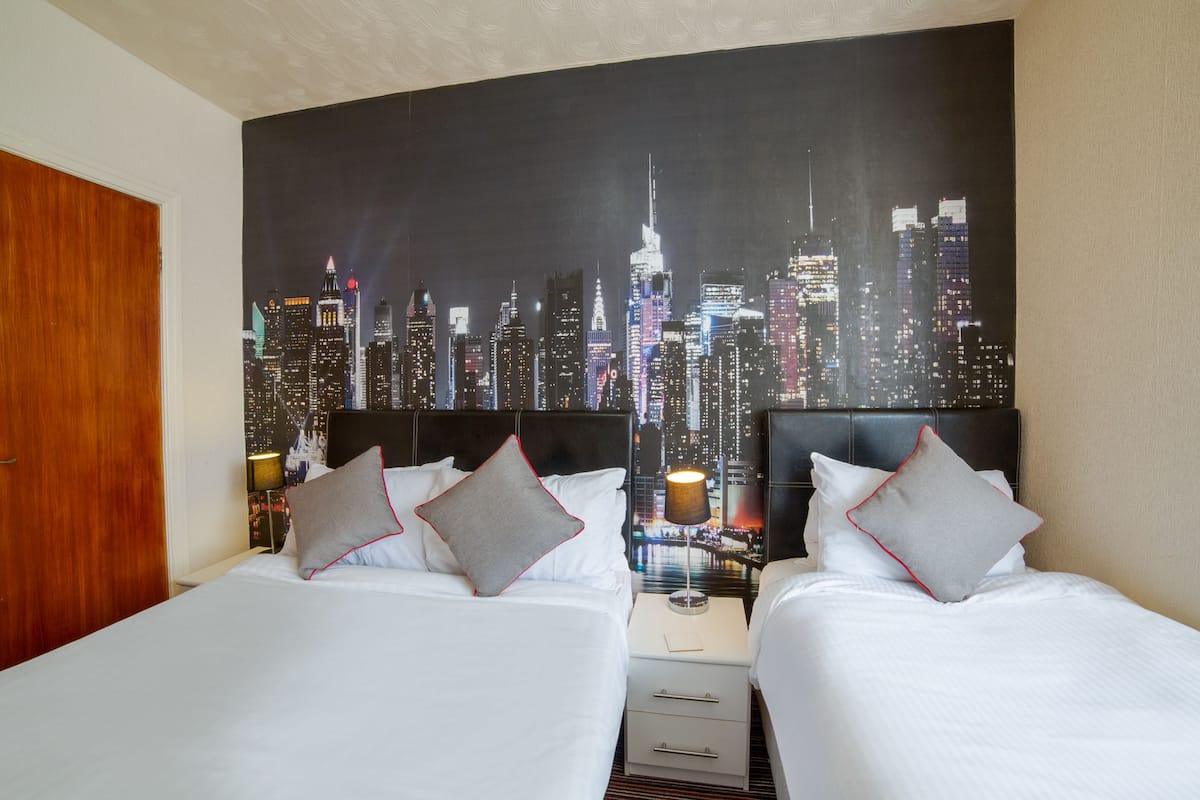 Family Room, Multiple Beds | Iron/ironing board (on request), WiFi (free)