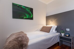 Basic Single Room | Premium bedding, pillow-top beds, desk, laptop workspace