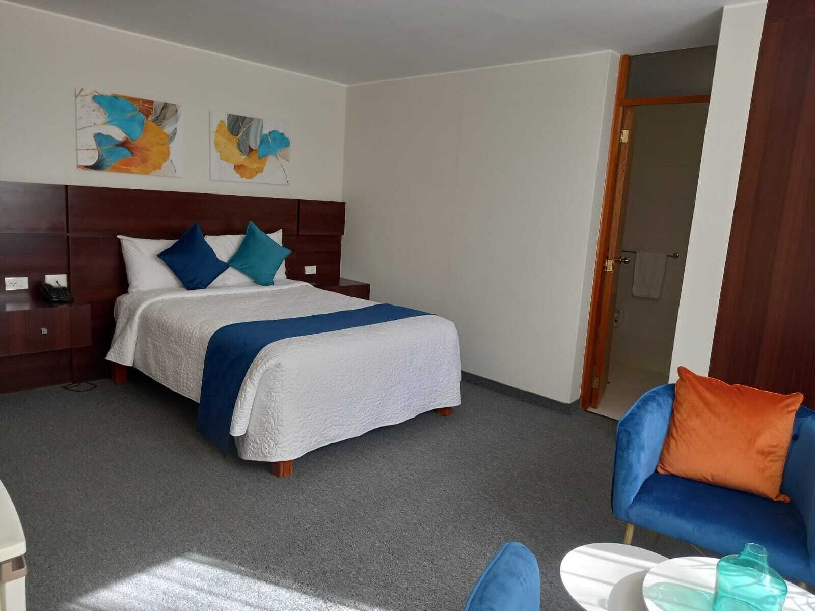 Hypo-allergenic bedding, minibar, laptop workspace, iron/ironing board