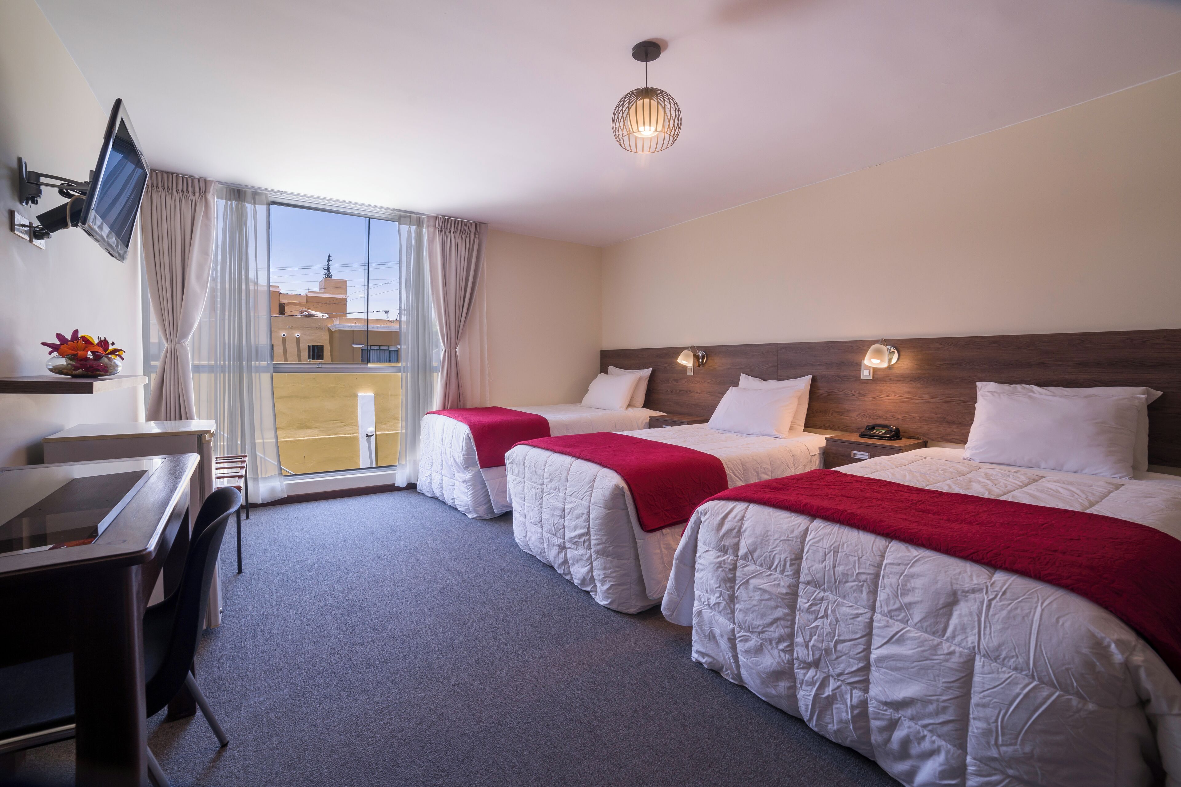 triple room | hypo-allergenic bedding, minibar, laptop workspace, iron/ironing board