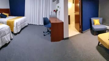 Ropa de cama hipoalergénica, minibar y espacio para trabajar con laptop