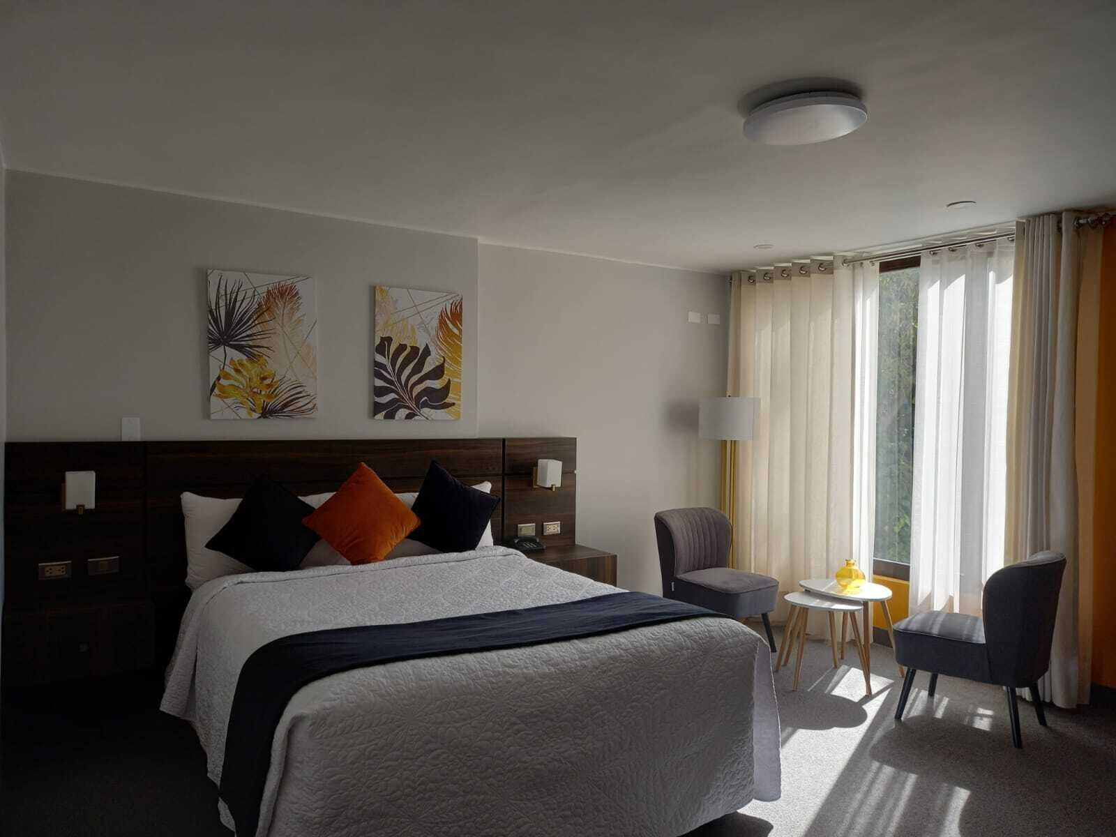 Hypo-allergenic bedding, minibar, laptop workspace, iron/ironing board