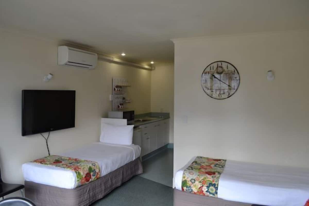 Blackout curtains, iron/ironing board, free WiFi, bed sheets