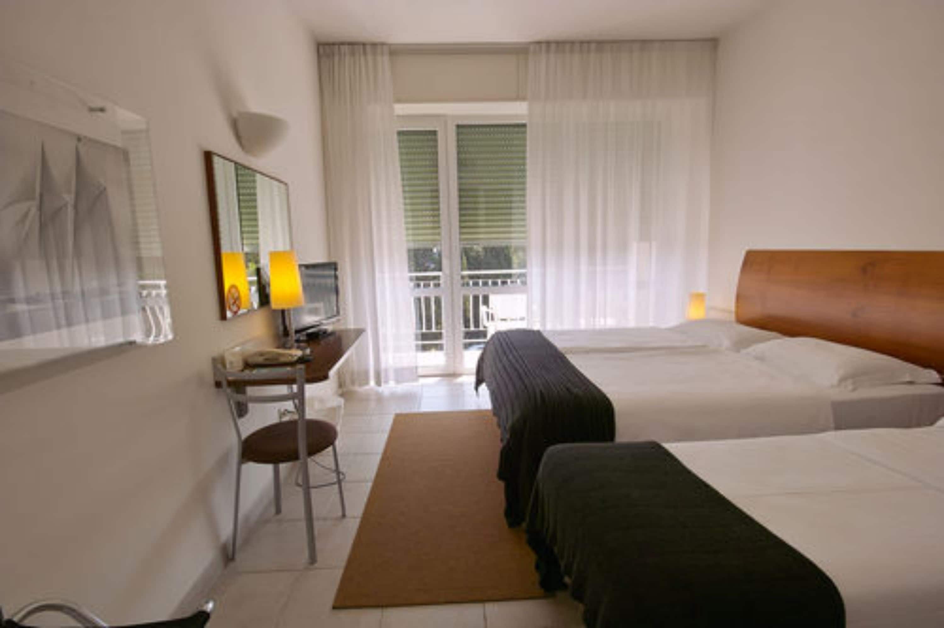 triple room, balcony, partial sea view (frontal) | 1 bedroom, down duvets, memory-foam beds, in-room safe