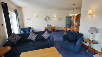 Self-Catering Two Bedroom Penthouse Estuary Apartment | Living area | TV