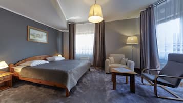 Suite, 1 Queen Bed, Balcony | In-room safe, desk, iron/ironing board, free WiFi