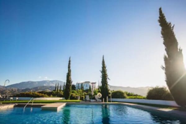 Seasonal outdoor pool, open 8:00 AM to 9:00 PM, pool umbrellas
