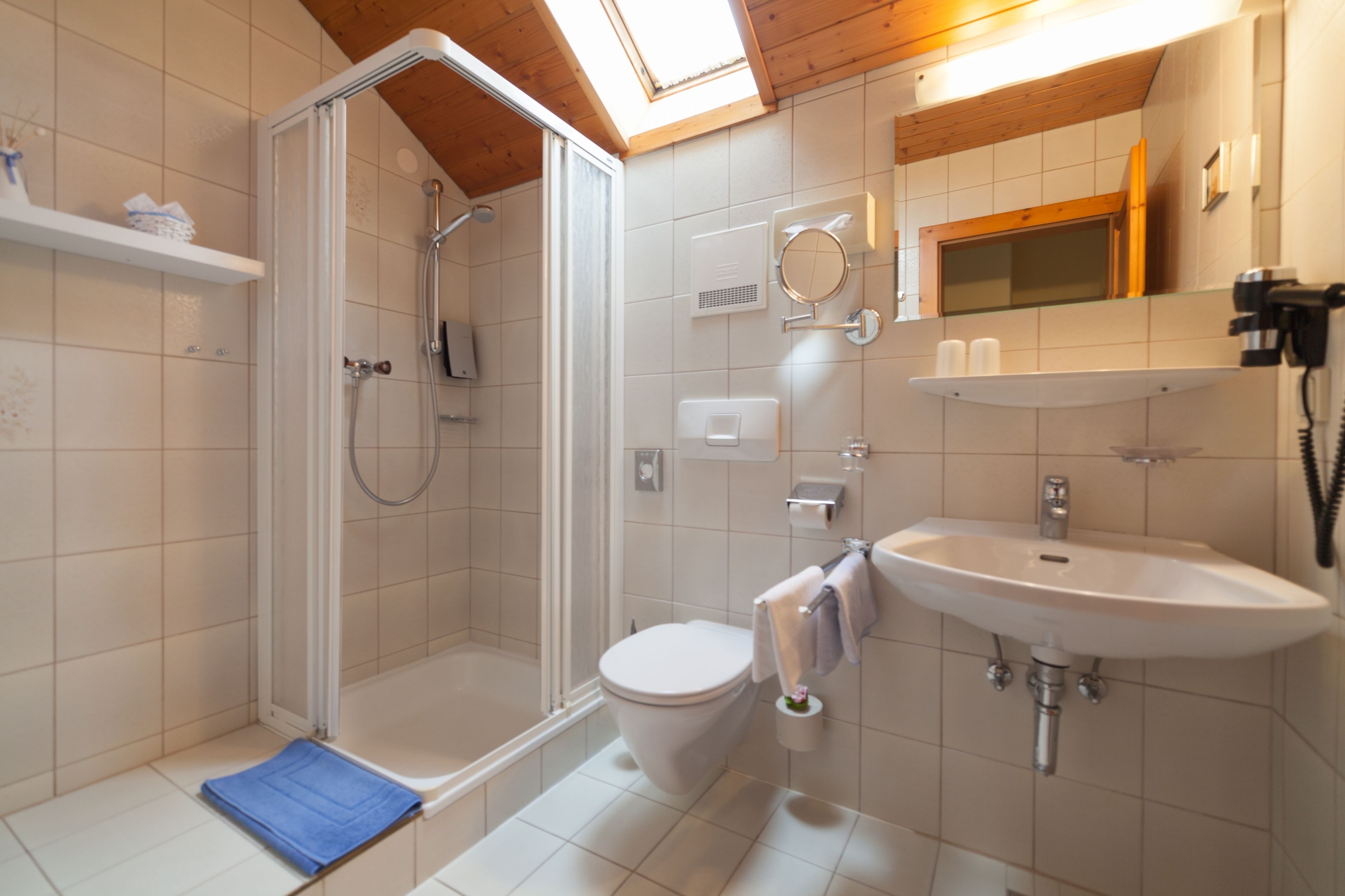 shower, free toiletries, hair dryer, slippers