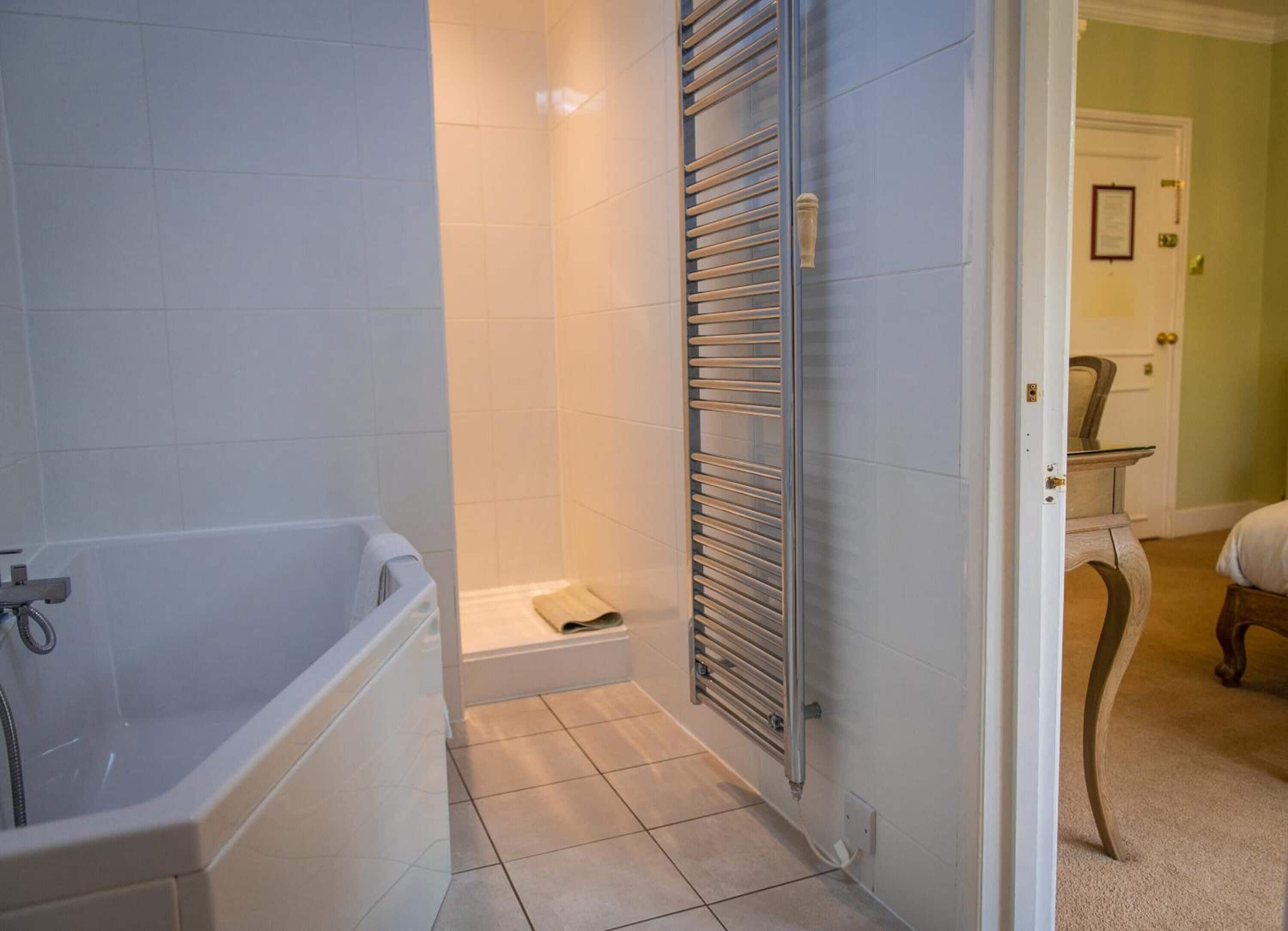 deluxe room | bathroom | free toiletries, hair dryer, towels, soap