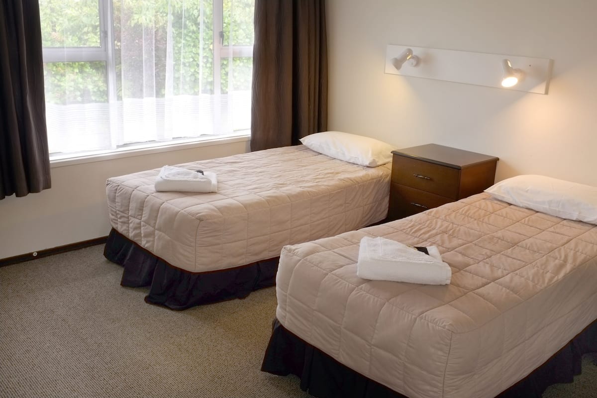 Family 1 Bedroom 8 | Premium bedding, free WiFi