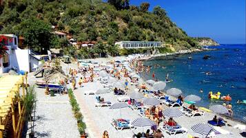 Private beach, white sand, free beach cabanas, sun-loungers