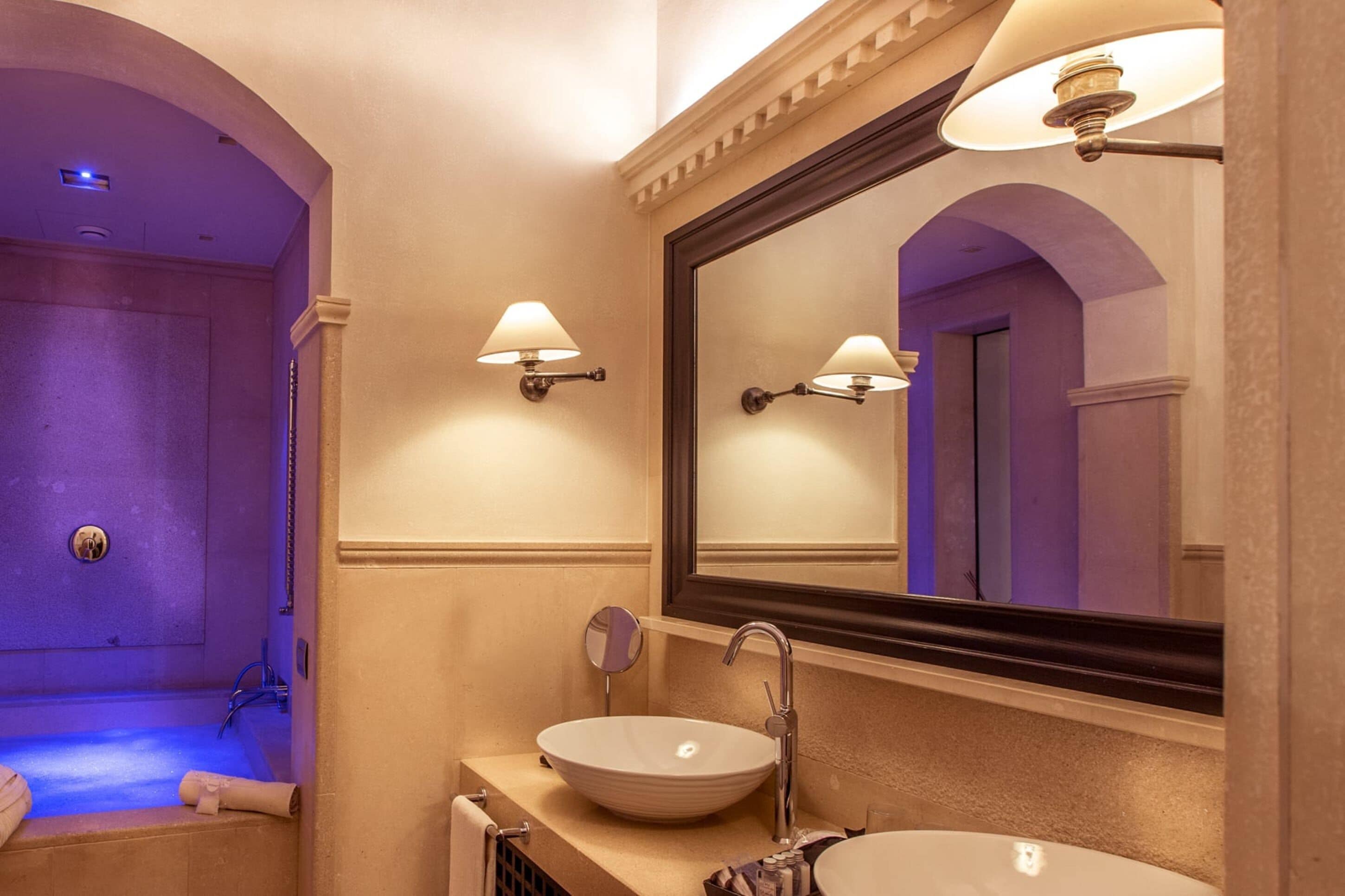 combined shower/bathtub, designer toiletries, hair dryer, bathrobes