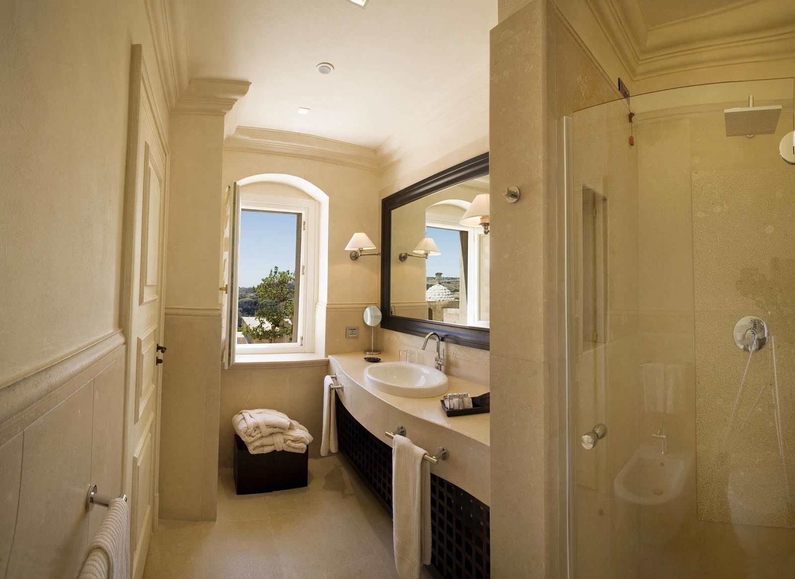 suite | bathroom | combined shower/bathtub, designer toiletries, hair dryer, bathrobes