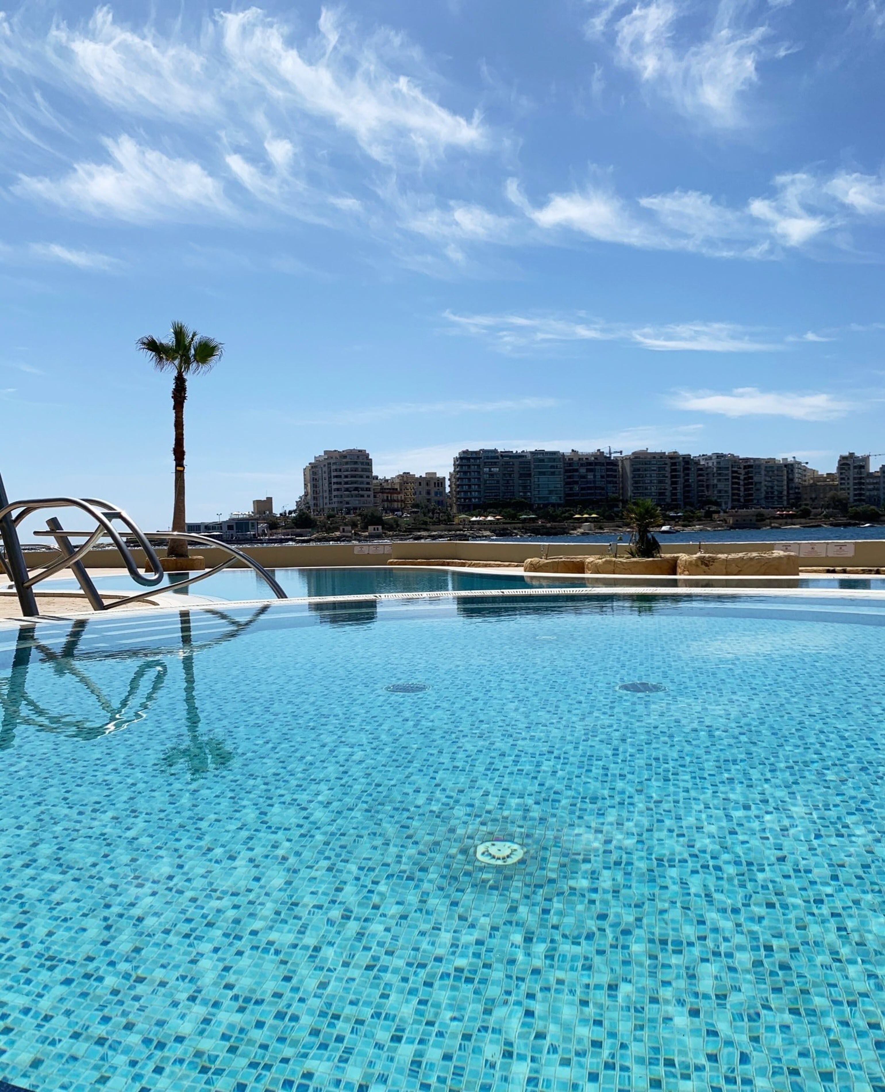 indoor pool, outdoor pool, free pool cabanas, pool umbrellas