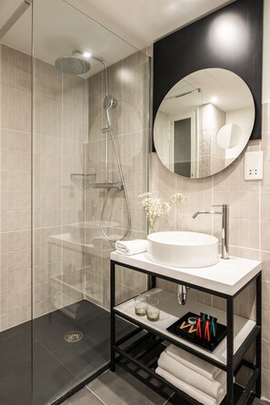 Shower, free toiletries, hair dryer, slippers