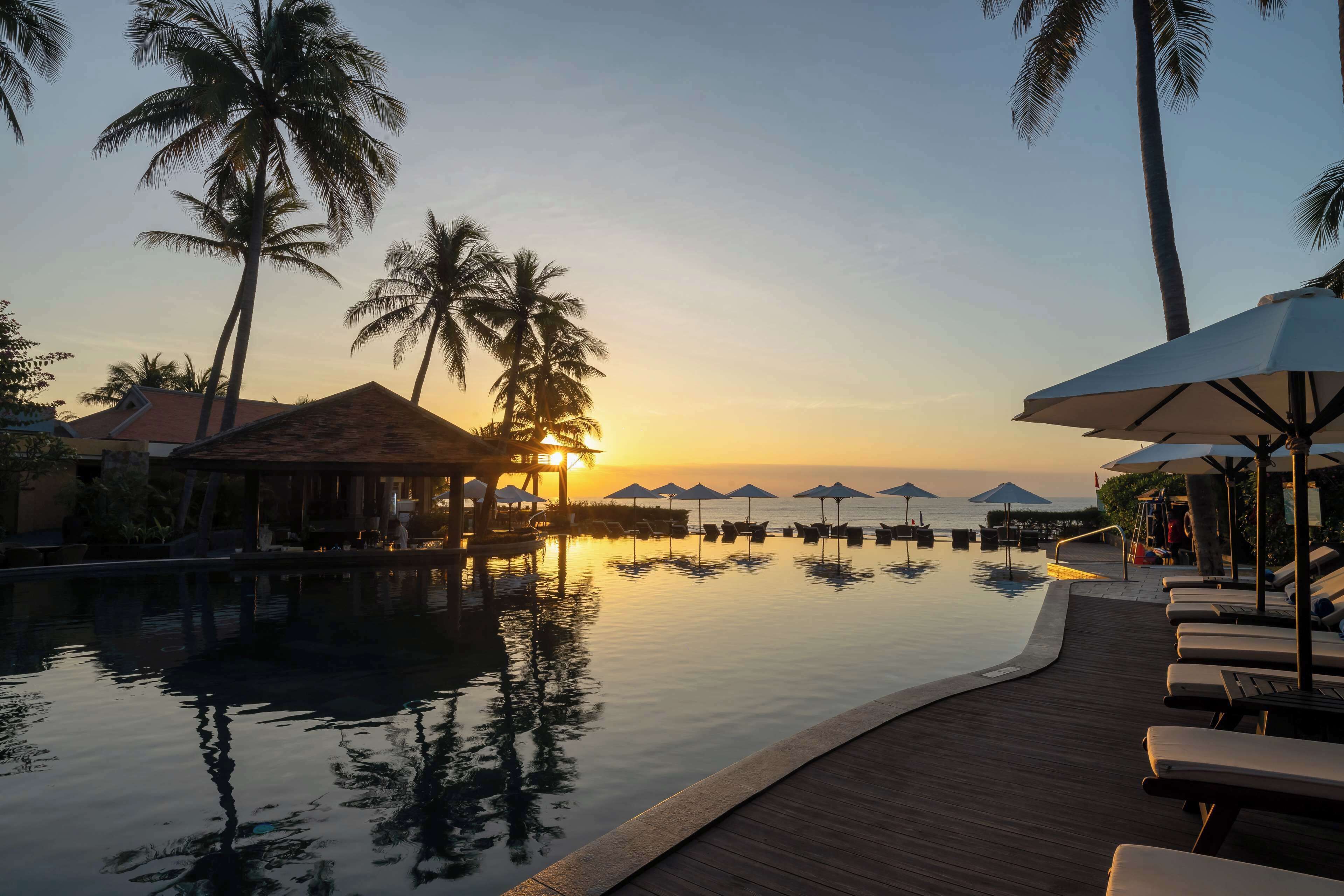 outdoor pool, pool umbrellas, pool loungers