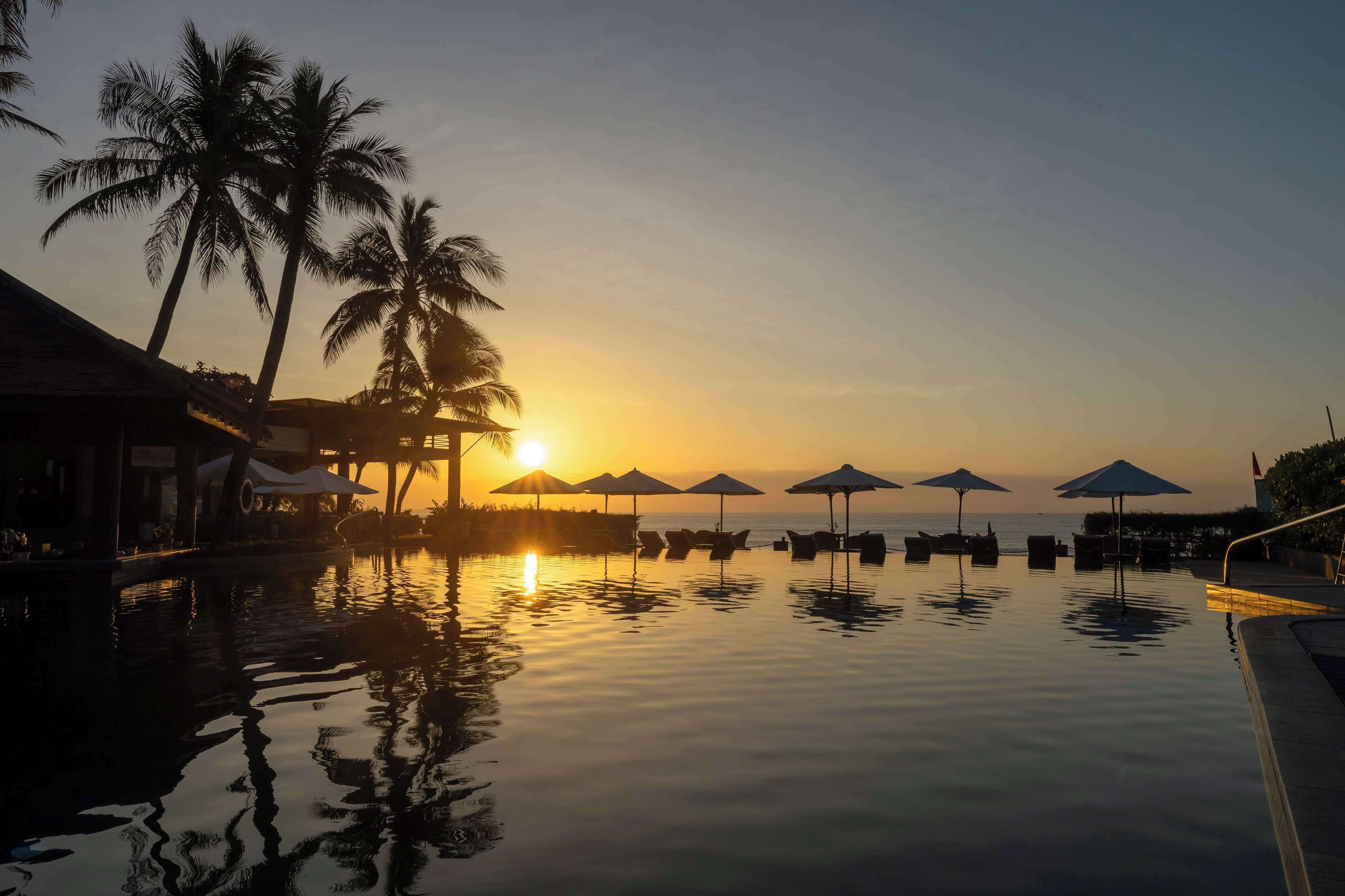 outdoor pool, pool umbrellas, pool loungers