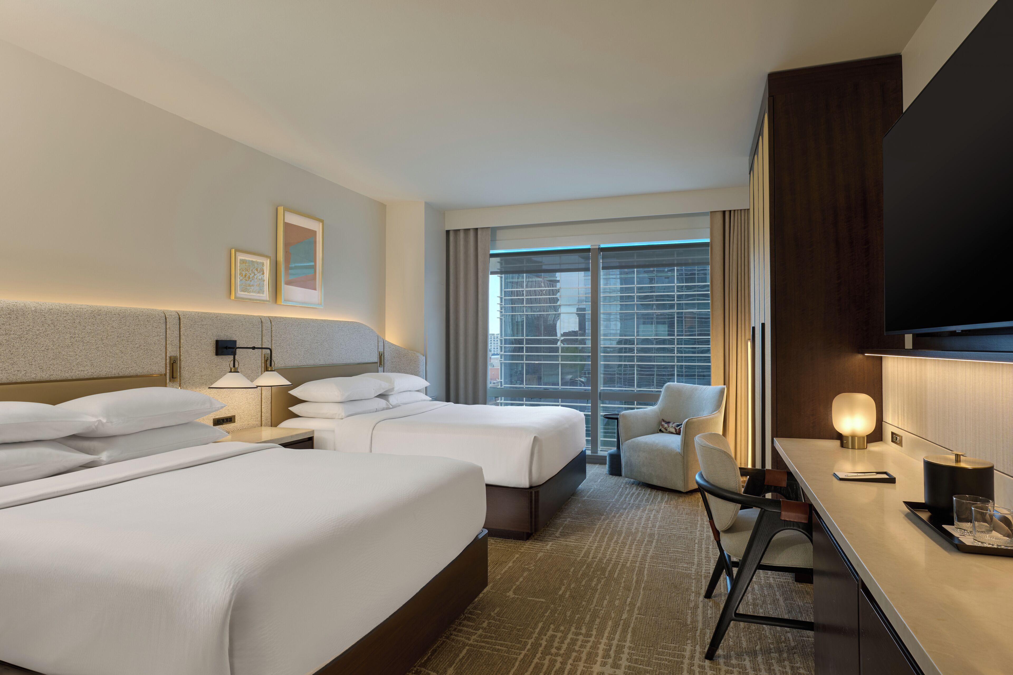 Premium bedding, down comforters, minibar, in-room safe