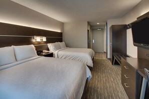 A hotel room with two beds, a TV, a desk, and a carpeted floor. - Holiday Inn Express Lexington North-Georgetown by IHG (Georgetown)