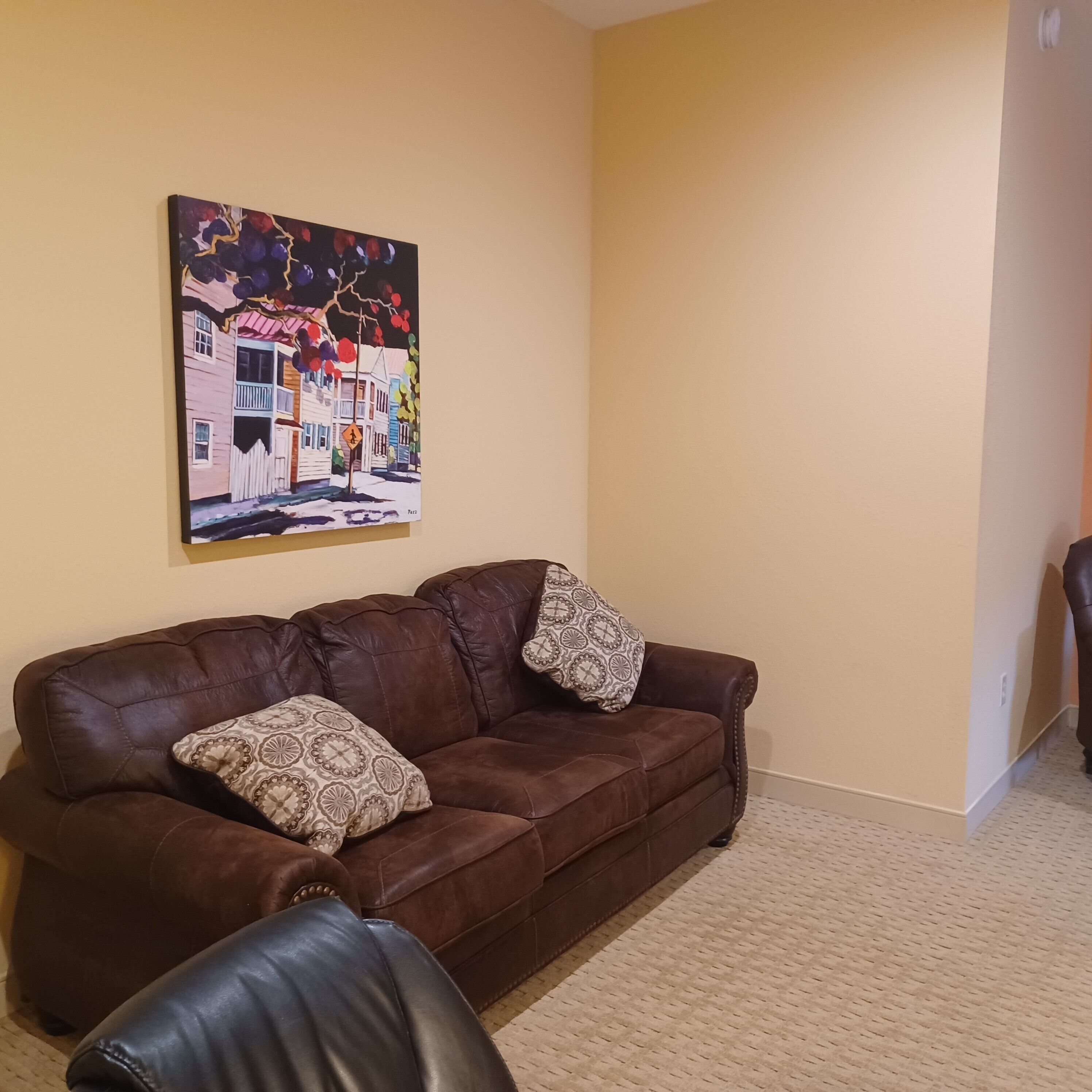 deluxe room, 1 king bed with sofa bed, jetted tub, city view | living area | 32-inch smart tv with cable channels