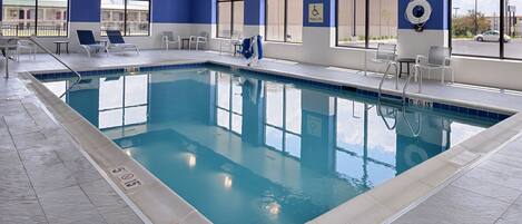 Indoor pool, open 9:00 AM to 10:00 PM, pool loungers