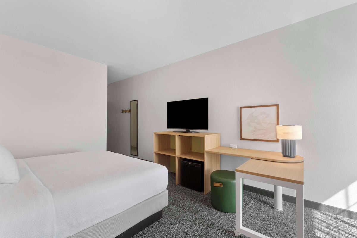 Premium bedding, desk, blackout drapes, iron/ironing board