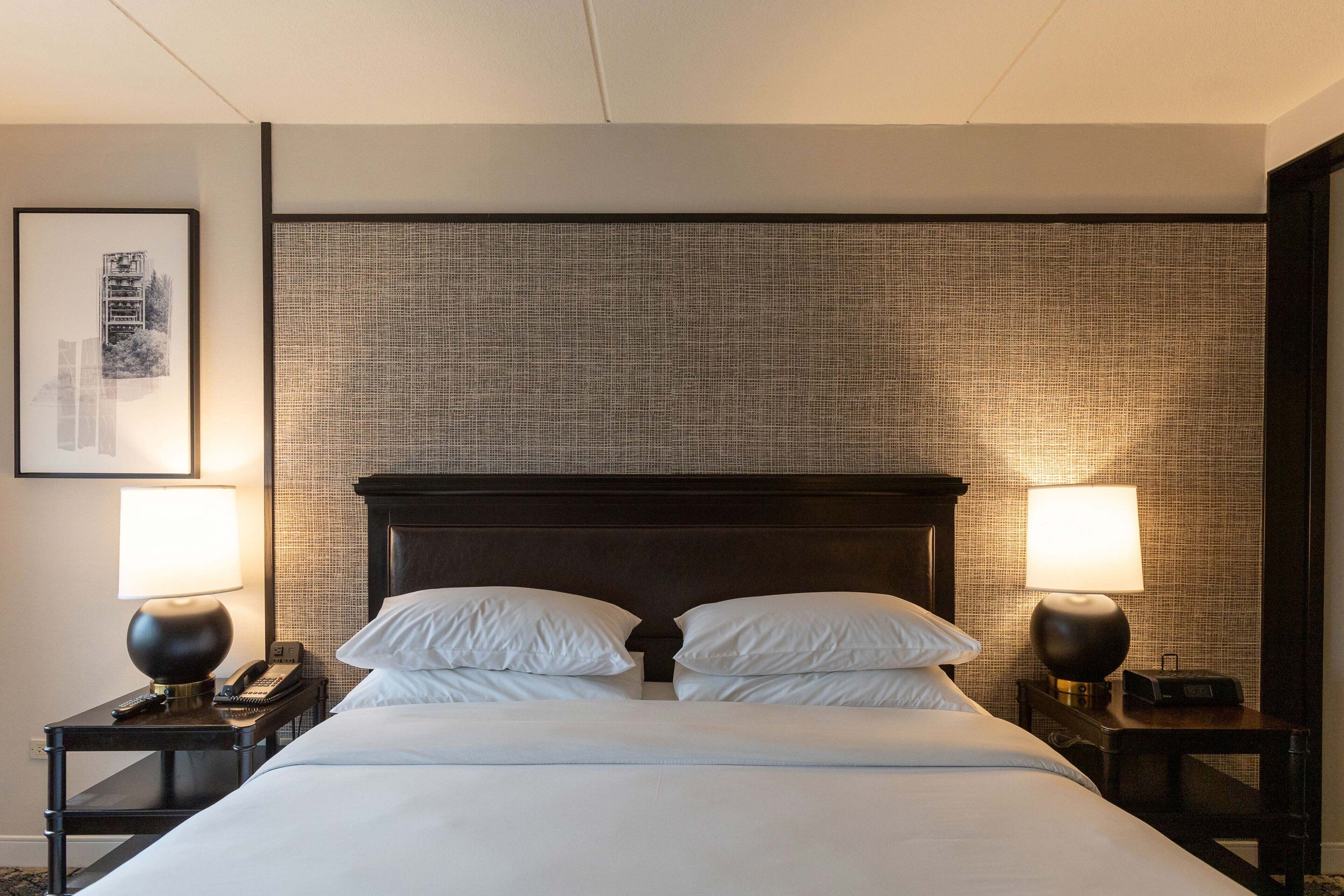 premium bedding, desk, blackout curtains, iron/ironing board