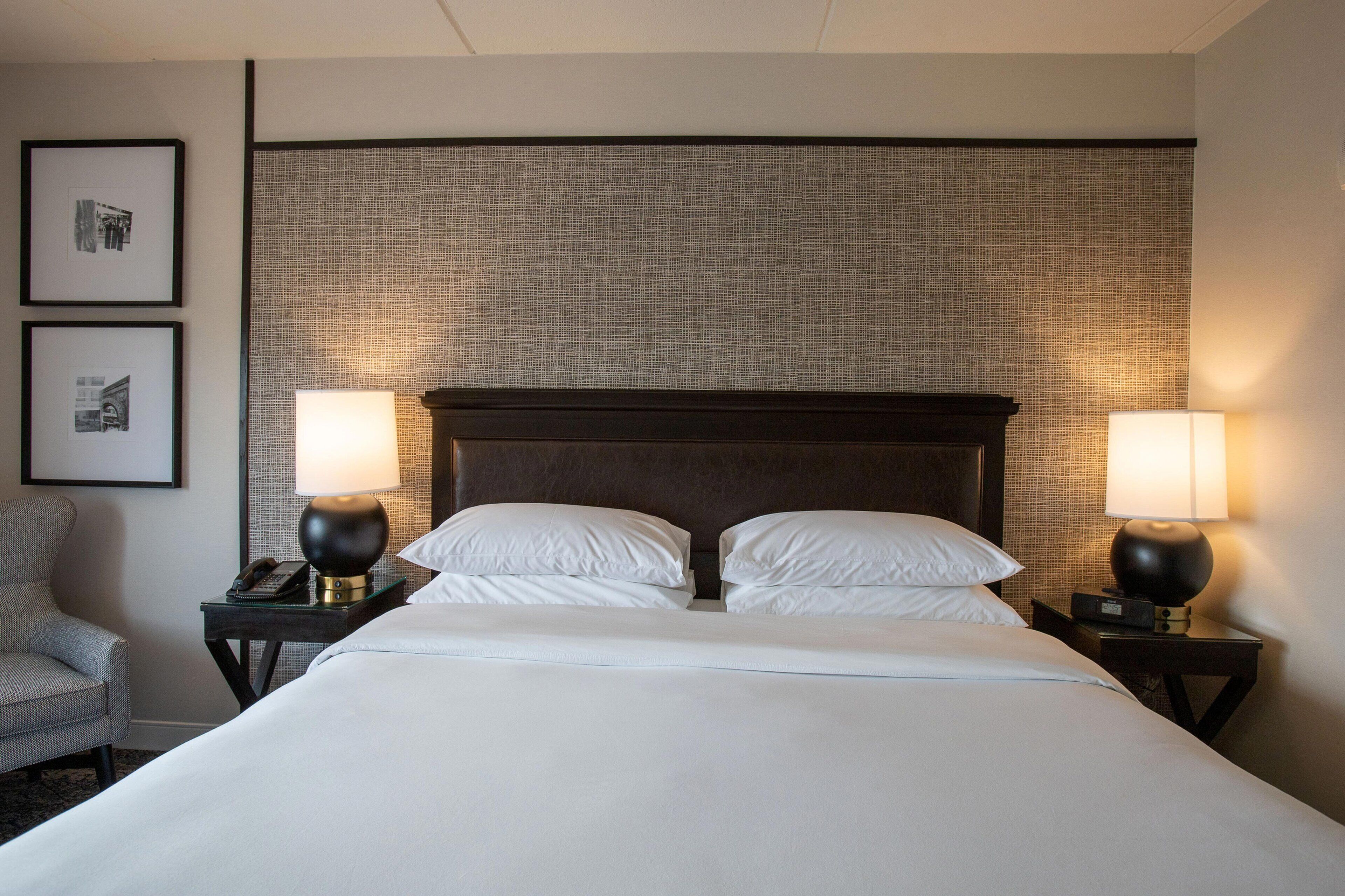 premium bedding, desk, blackout curtains, iron/ironing board