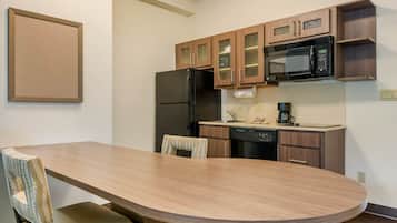 Suite, 1 Bedroom | Private kitchenette | Full-size fridge, microwave, stovetop, dishwasher