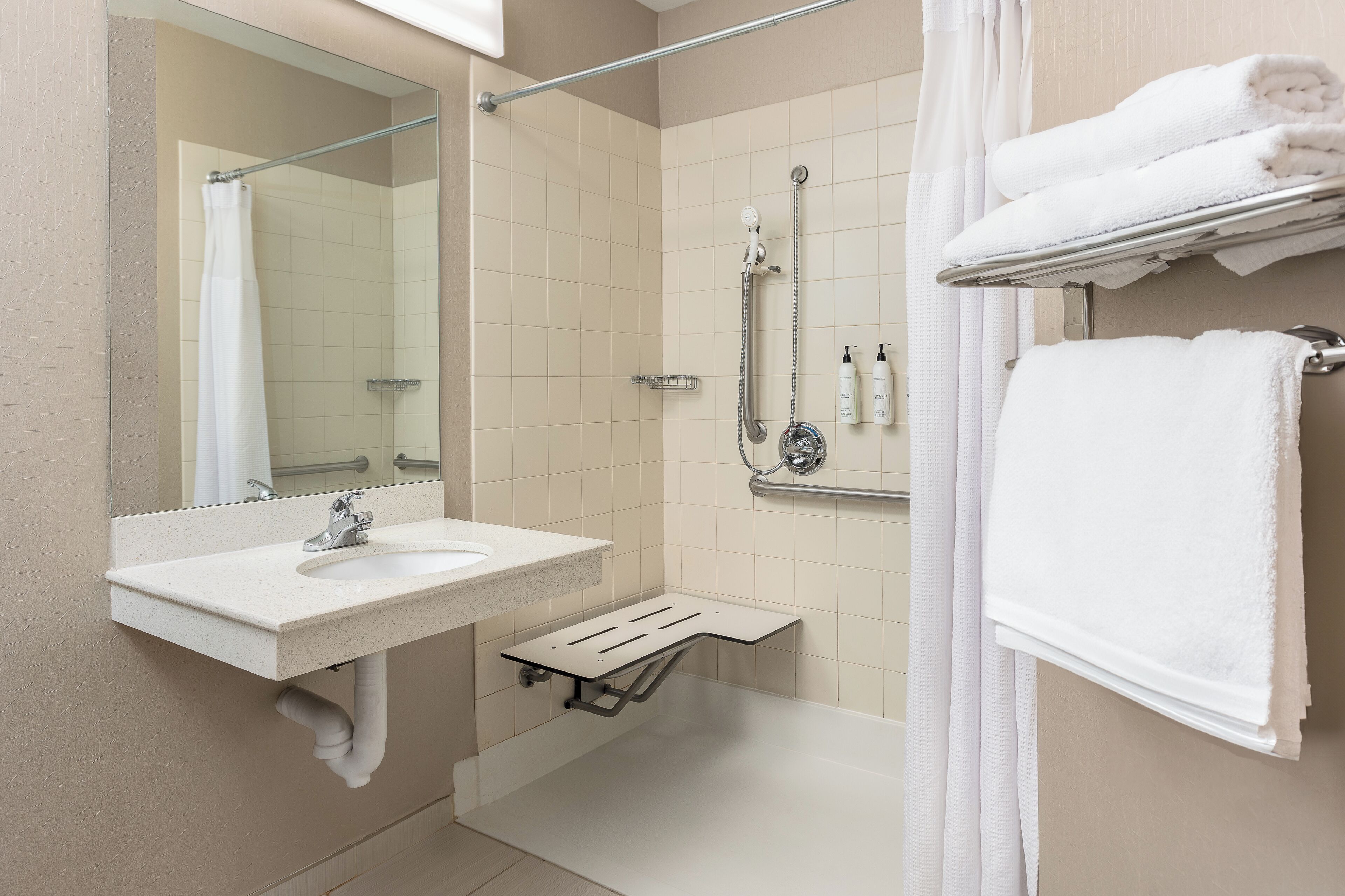 combined shower/bathtub, free toiletries, hair dryer, towels