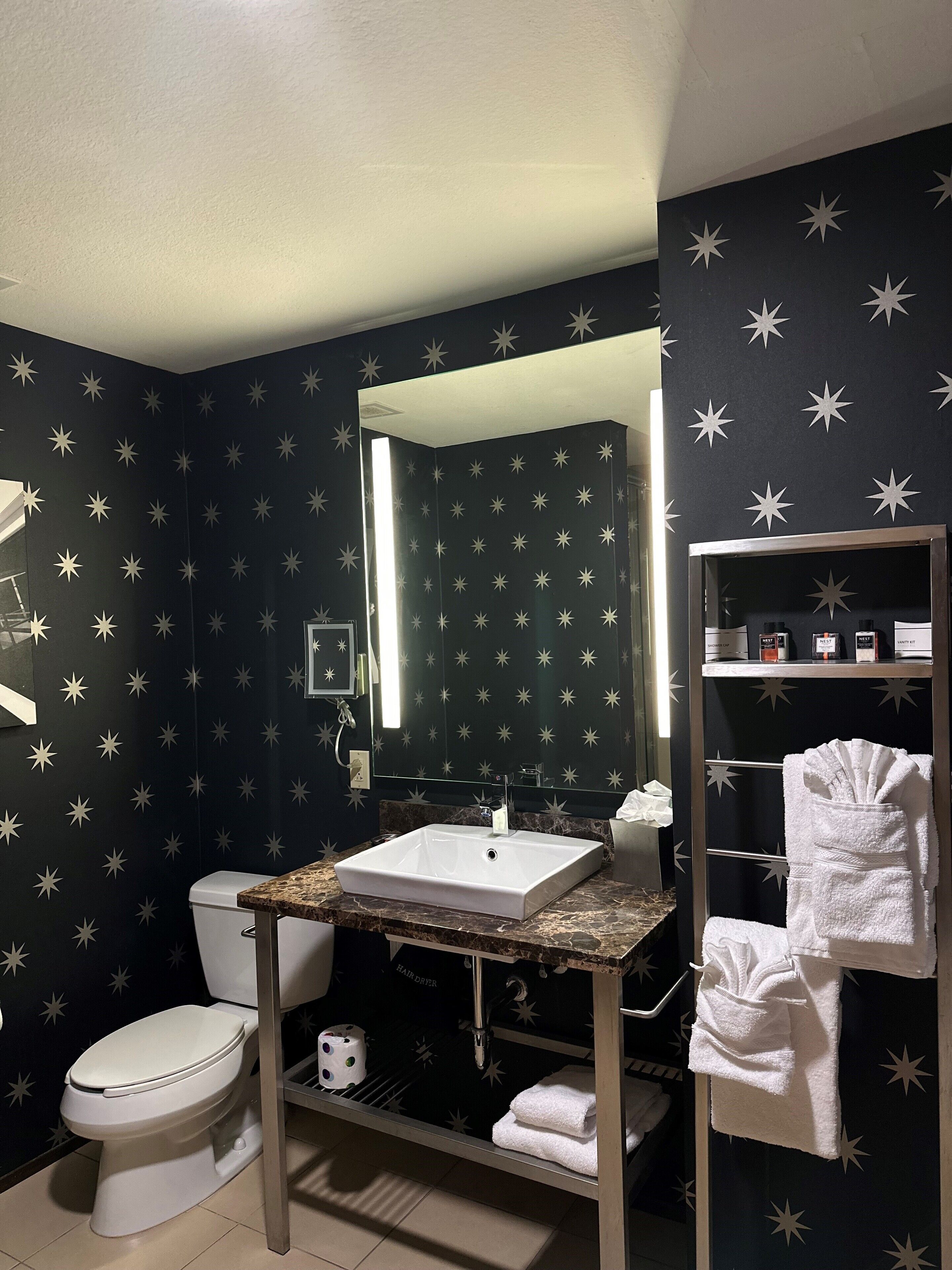 shower, rainfall showerhead, designer toiletries, hair dryer