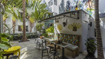 Breakfast, lunch, dinner served; Latin American cuisine, garden views